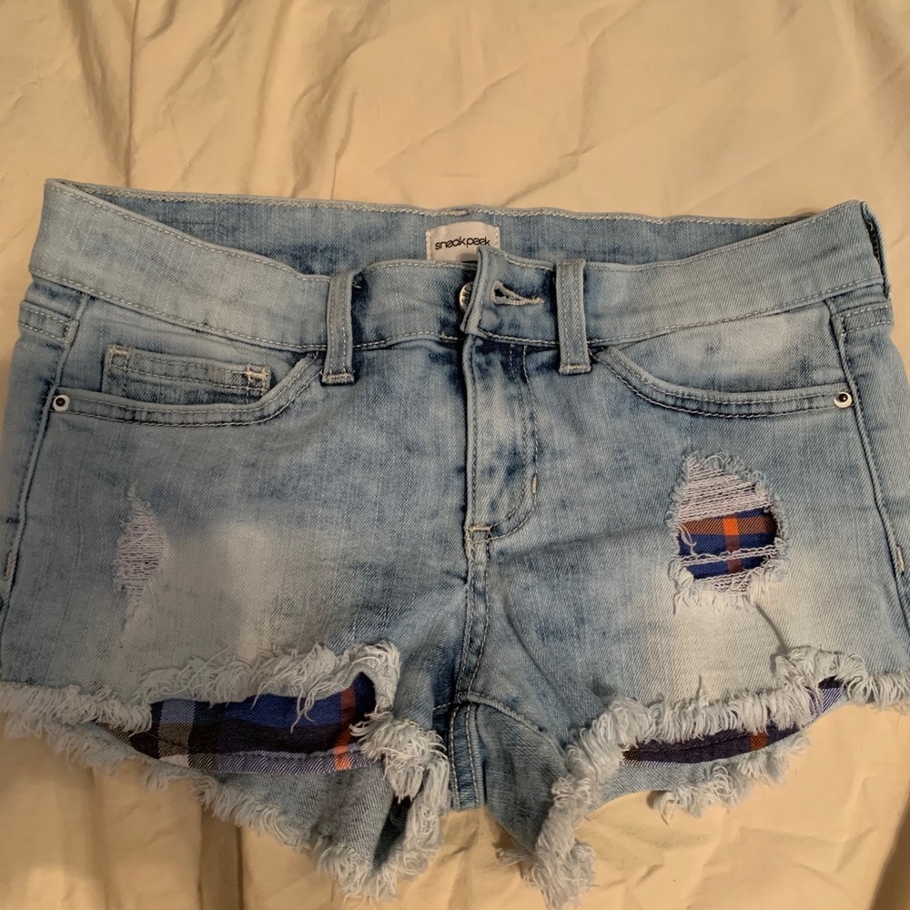 Denim shorts with plaid pockets